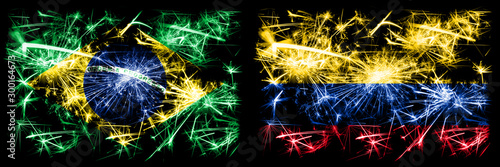 Brazil, Brazilian vs Colombia, Colombian New Year celebration sparkling fireworks flags concept background. Combination of two states flags © Vlad