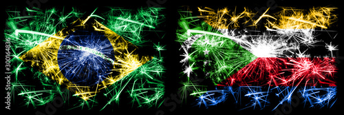 Brazil, Brazilian vs Comoros, Comorian New Year celebration sparkling fireworks flags concept background. Combination of two states flags © Vlad