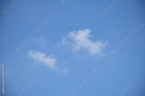 Blue sky background and white clouds soft focus. blue sky cloudsfor background.Natural background. © Likhit Wongphen