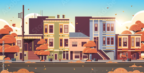 city building houses exterior modern town street in autumn sunset cityscape background horizontal flat vector illustration
