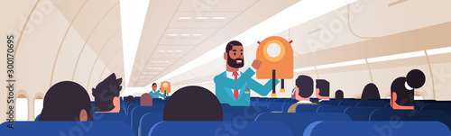 steward explaining passengers how to use jacket life vest in emergency situation african american flight attendants safety demonstration concept modern airplane board interior horizontal flat vector