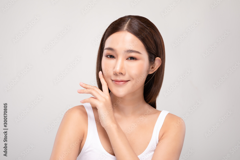 Beautiful Asian young woman touching soft cheek smile with clean and fresh skin Happiness and cheerful with positive emotional,isolated on white background,Beauty and Cosmetics Concept Beautiful Asian young woman touching soft cheek smile with clean and fresh skin Happiness and cheerful with positive emotional,isolated on white background,Beauty and Cosmetics Concept