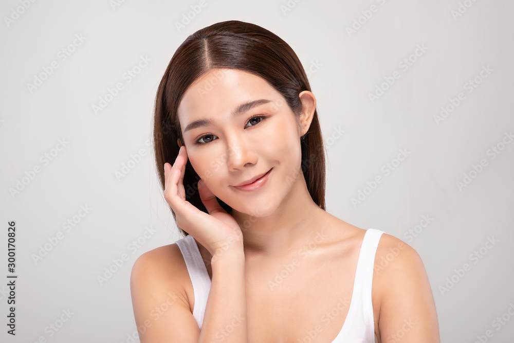 Beautiful Asian young woman touching soft cheek smile with clean and fresh skin Happiness and cheerful with positive emotional,isolated on white background,Beauty and Cosmetics Concept Beautiful Asian young woman touching soft cheek smile with clean and fresh skin Happiness and cheerful with positive emotional,isolated on white background,Beauty and Cosmetics Concept