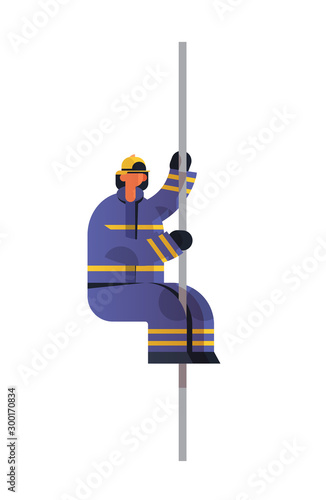 brave fireman sliding down the pole of fire station firefighter wearing uniform and helmet firefighting emergency service extinguishing fire concept flat vertical full length vector illustration