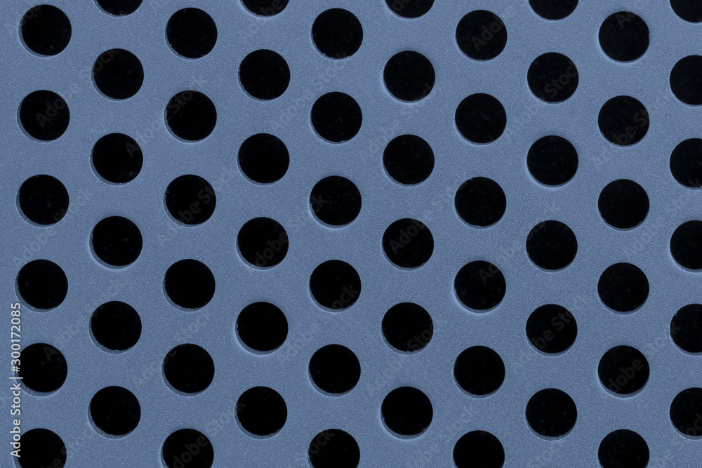Metal grid texture with holes close-up, blue steel surface, modern background Metal grid texture with holes close-up, blue steel surface, modern background