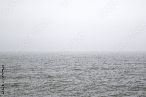 foggy Baltic sea in neutral colors
