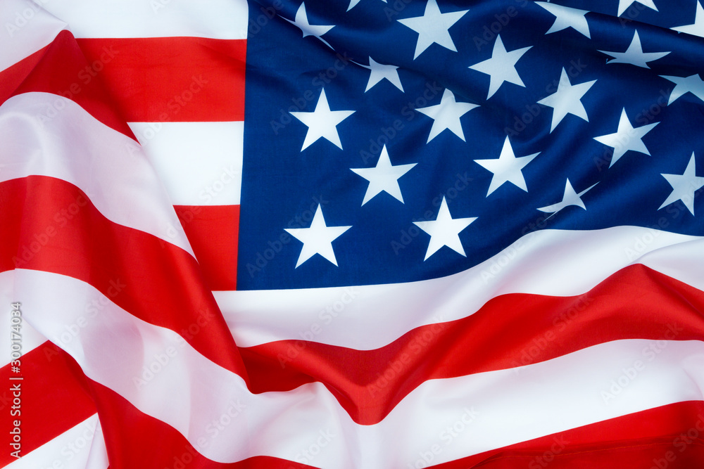 US American flag on white background. For USA Memorial day, Veterans day, Labor day, or 4th of July celebration. Top view, copy space for text. US American flag on white background. For USA Memorial day, Veterans day, Labor day, or 4th of July celebration. Top view, copy space for text.
