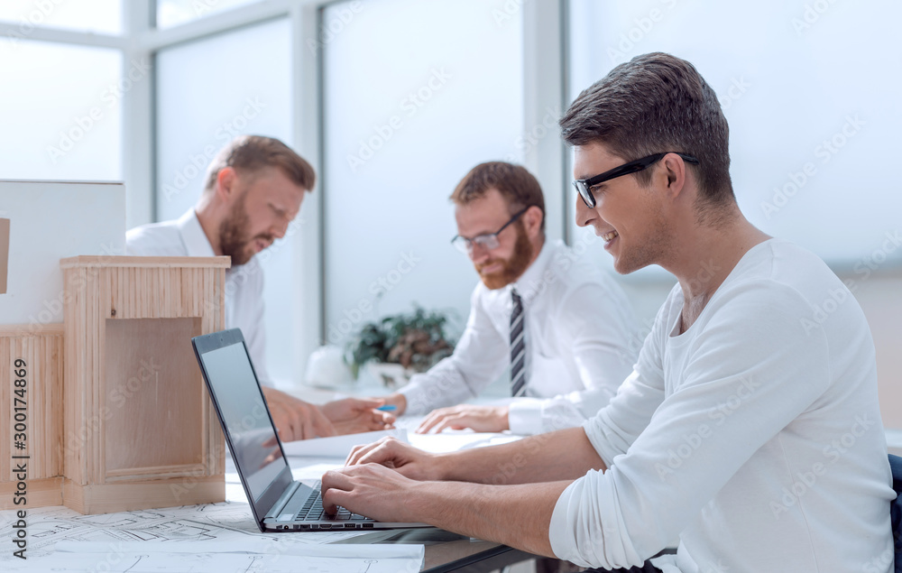group of architects and designers are working on a new project. group of architects and designers are working on a new project.