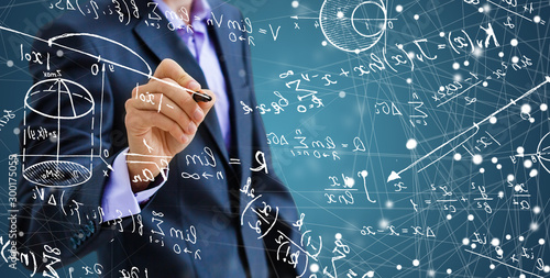 Fotografie, Obraz Man writing math formulas on the screen
