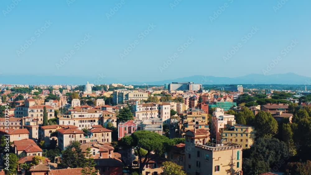 Aerial view of Rome Italy residential areas with houses, flight on drone above city buildings in sunny day Aerial view of Rome Italy residential areas with houses, flight on drone above city buildings in sunny day