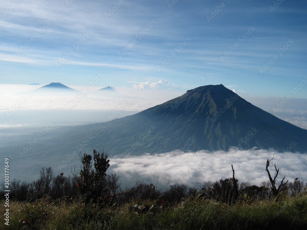 Landscapes of Mount Sumbing with clouds and blue sky, seen from Mount Sindoro volcano, Central Java, Indonesia [2169]