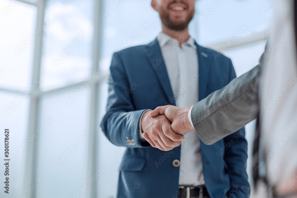 business partners shaking hands . concept of partnership - obrazy, fototapety, plakaty 