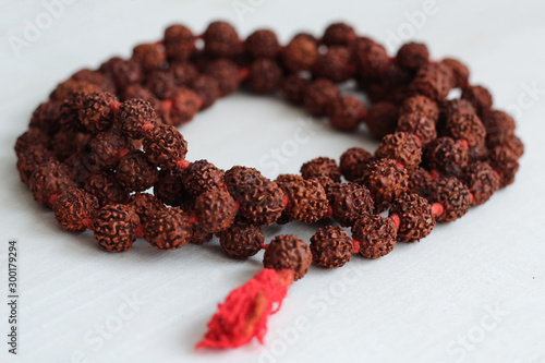 Japa mala. Prayer beads made from the seeds of the rudraksha tree. photo