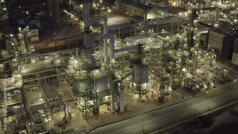 Aerial view of petrochemical oil refinery (refining complex) at night Aerial view of petrochemical oil refinery (refining complex) at night