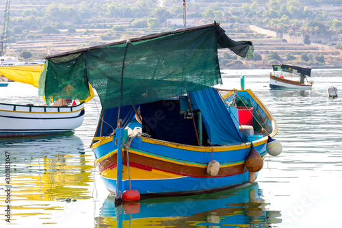 Marsaxlokk. Traditional boats Luzzu in the old harbor. photo