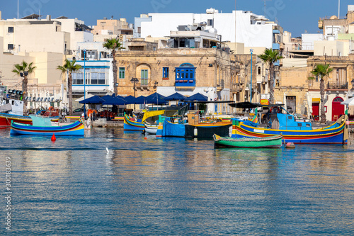 Marsaxlokk. Traditional boats Luzzu in the old harbor. photo