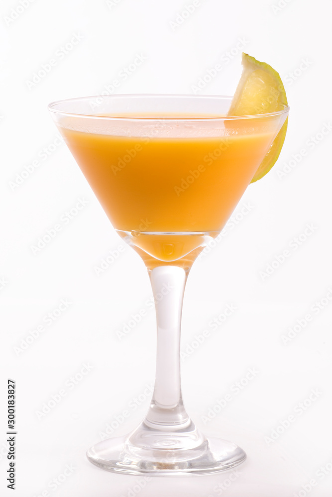 Mango drink on glass, yellow sweet drink
