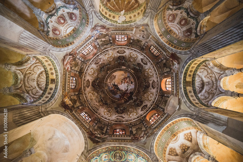 Ravenna, Italy - September 11, 2019: Interior of Basilica of San Vitale, which has important examples of early Christian Byzantine art and architecture. It was resignated as Unesco World Heritage. 