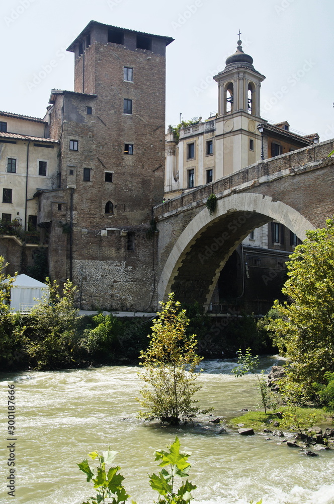 Photo of Castello Caetani Historical landmark, river Tiber and Ponte Fabricio bridge, view from Lungotevere de' Cenci, Rome, Italy