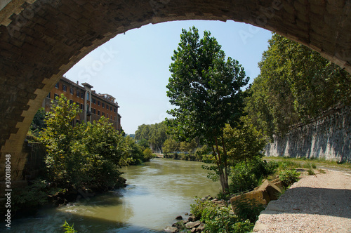 Photo of Fate Bene Fratelli Hospital and river Tiber, view under Ponte Fabricio bridge, Rome, Italy photo