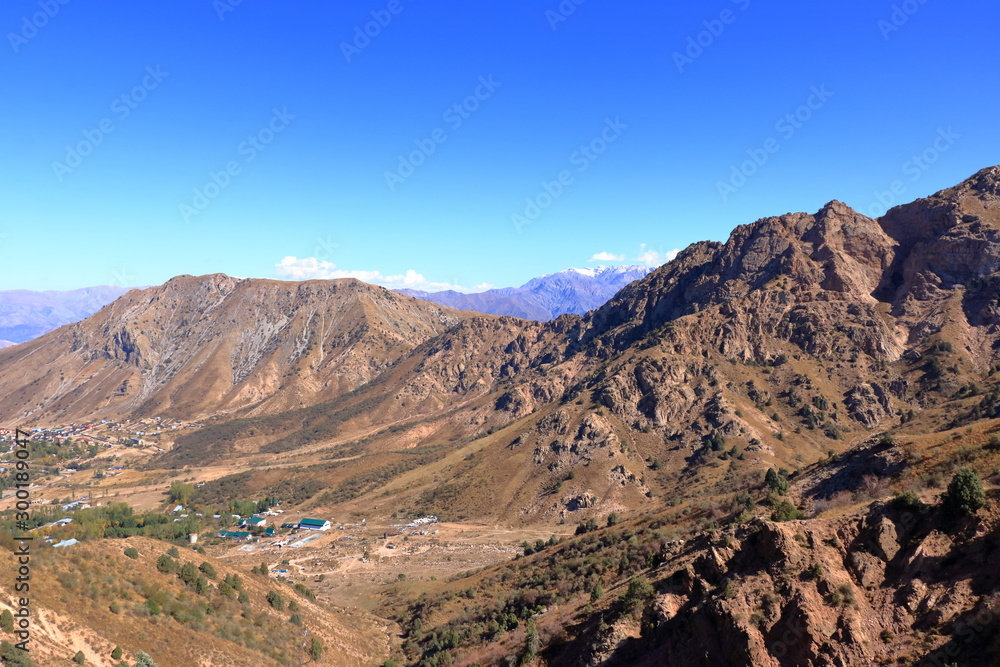 Scenic landscape of Tian Shan mountain range near Chimgan in Uzbekistan