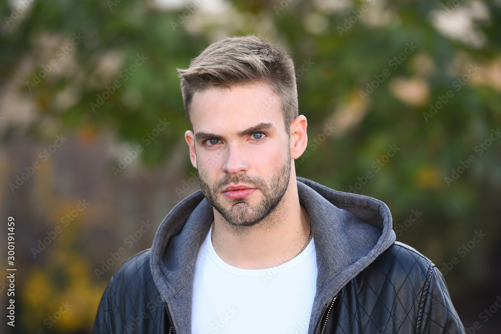 Hes handsome. Handsome man on autumn day. Caucasian guy with unshaven handsome face and stylish blond hair. Confident and handsome. Mens fashion. Style and grooming Hes handsome. Handsome man on autumn day. Caucasian guy with unshaven handsome face and stylish blond hair. Confident and handsome. Mens fashion. Style and grooming