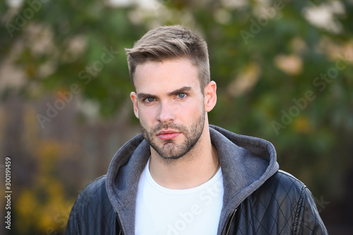 Hes handsome. Handsome man on autumn day. Caucasian guy with unshaven handsome face and stylish blond hair. Confident and handsome. Mens fashion. Style and grooming