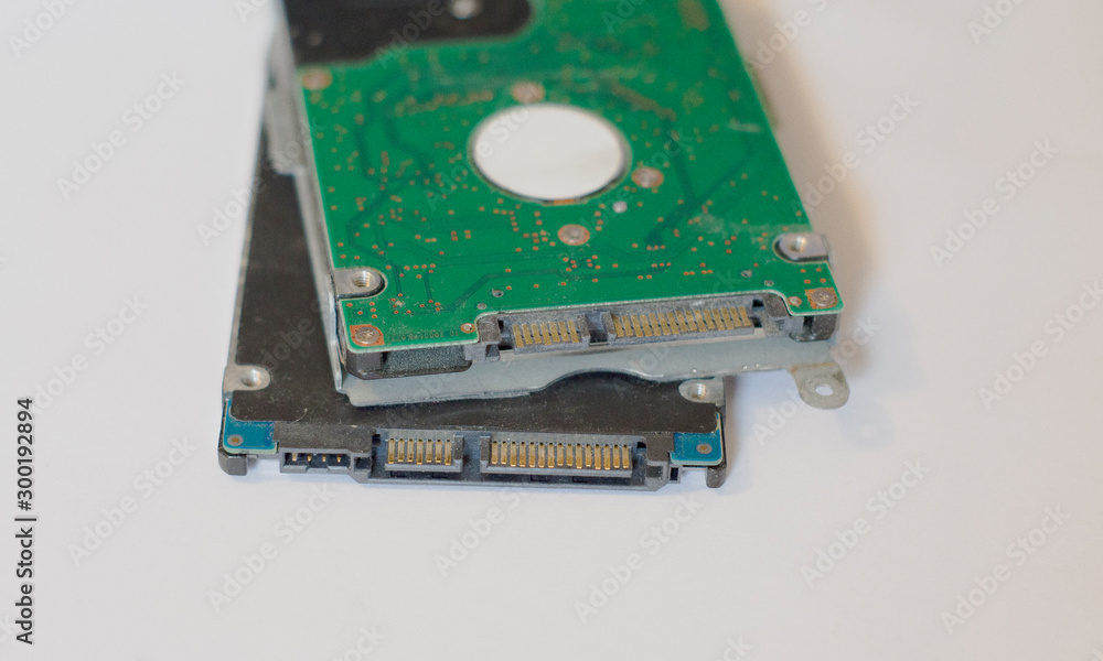 2 hard drives on wite background 2 hard drives on wite background