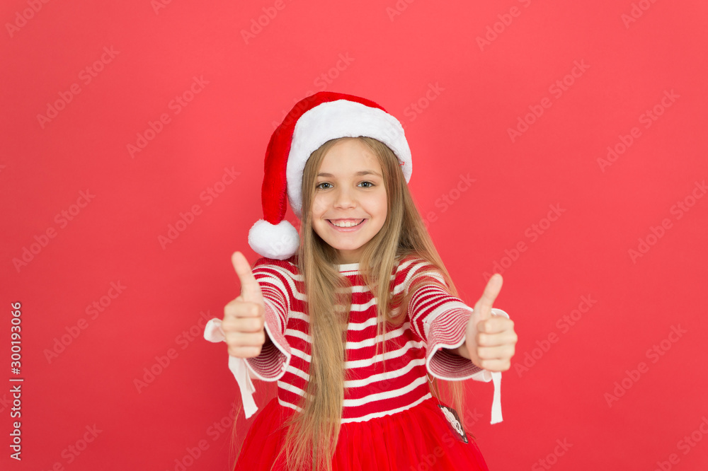 Best wishes. Joyful kid. Child santa costume believe in miracle. Girl little kid on red background. Merry christmas and happy new year. Christmas party. Cheerful girl having fun christmas eve Best wishes. Joyful kid. Child santa costume believe in miracle. Girl little kid on red background. Merry christmas and happy new year. Christmas party. Cheerful girl having fun christmas eve