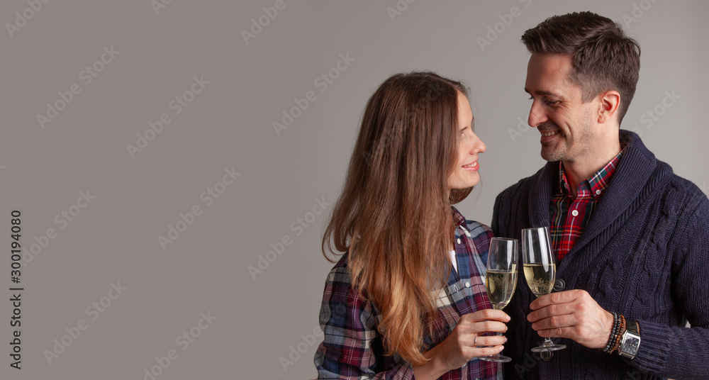 Couple clinking glasses of champagne Couple clinking glasses of champagne
