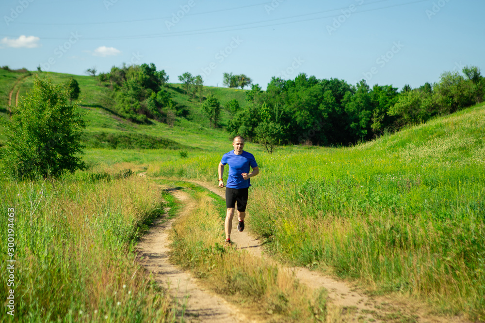 Trail jogger man outdoor in rural place