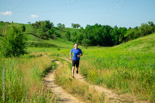 Trail jogger man outdoor in rural place © Dmitry Bairachnyi