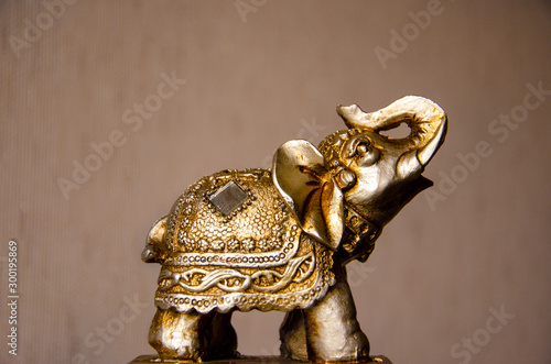 figurine of golden dragon on white background