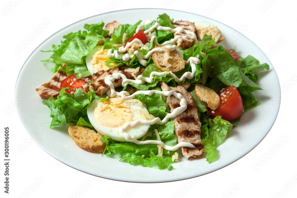Caesar salad with grill chicken fillet isolated on white background Caesar salad with grill chicken fillet isolated on white background