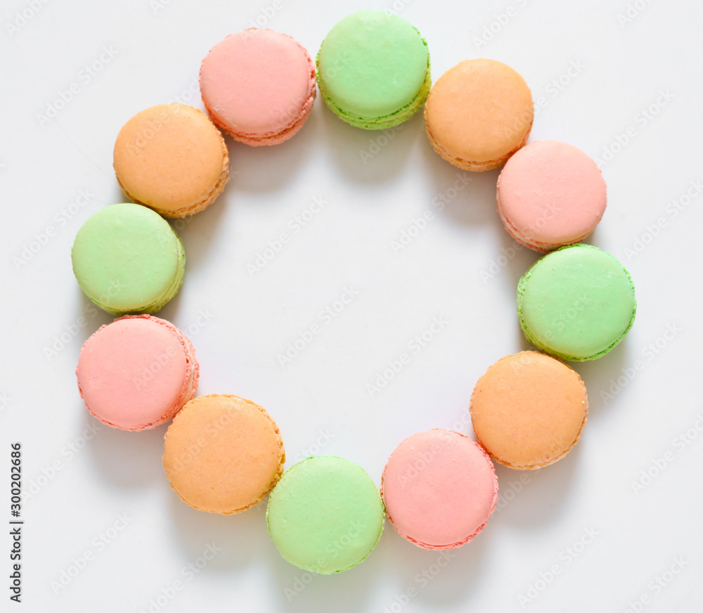 Fototapeta premium Tasty macarons on white background