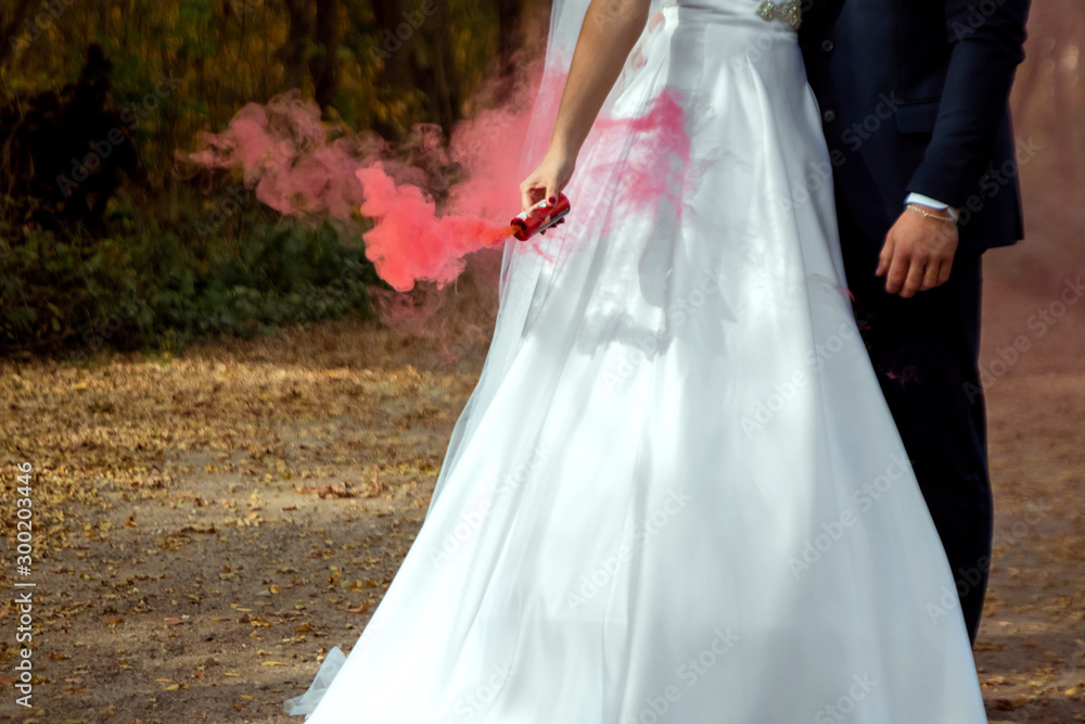 bride and groom for a walk. The concept of marriage, family relationships, wedding paraphernalia.