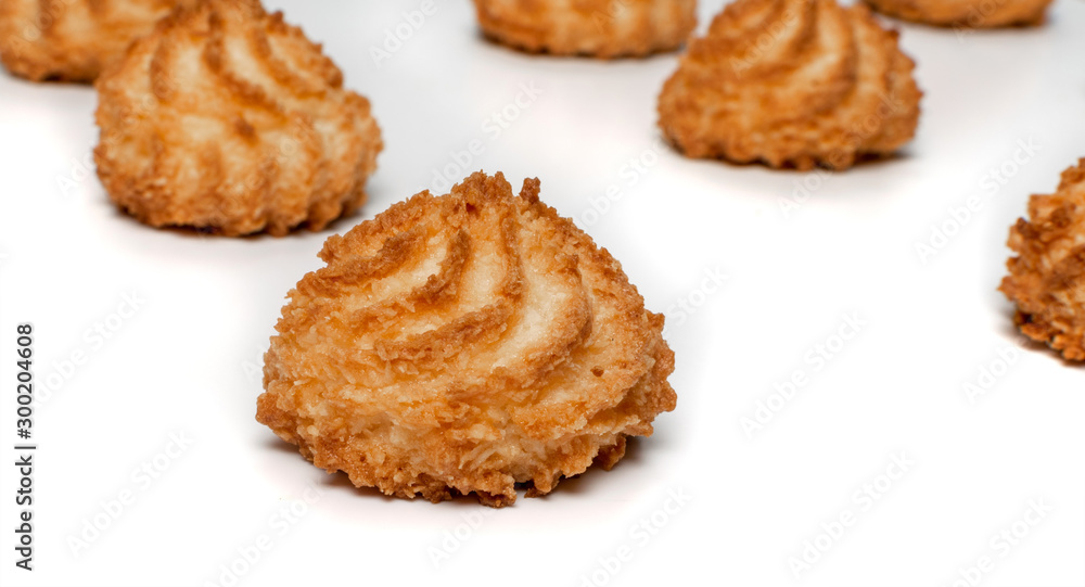 Natural baked coconut cookies or cocoanut macaroons with coco chips Natural baked coconut cookies or cocoanut macaroons with coco chips