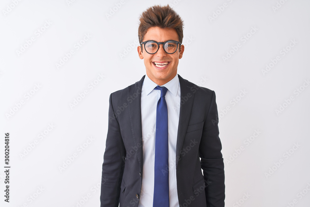 Young handsome businessman wearing suit and glasses over isolated white background with a happy and cool smile on face. Lucky person. Young handsome businessman wearing suit and glasses over isolated white background with a happy and cool smile on face. Lucky person.