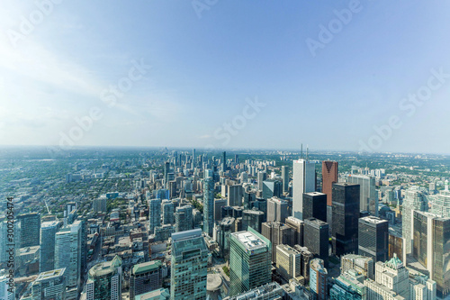 Aerial view of Toronto City Skyscrapers, Looking northeast from top of CN Tower toward East York and Scarborough districts in summer, Union Station at bottom right. Toronto City, Ontario, Canada