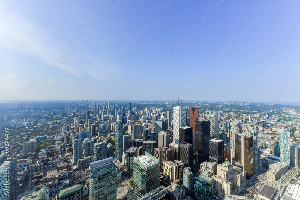 Aerial view of Toronto City Skyscrapers, Looking northeast from top of CN Tower toward East York and Scarborough districts in summer, Union Station at bottom right. Toronto City, Ontario, Canada