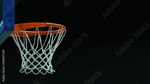 Basketball hoop on a dark background in a sports complex © makedonski2015