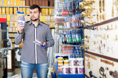 Man deciding on best glue