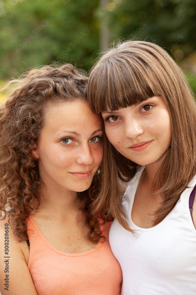Portrait happy young and attractive girlfriends
