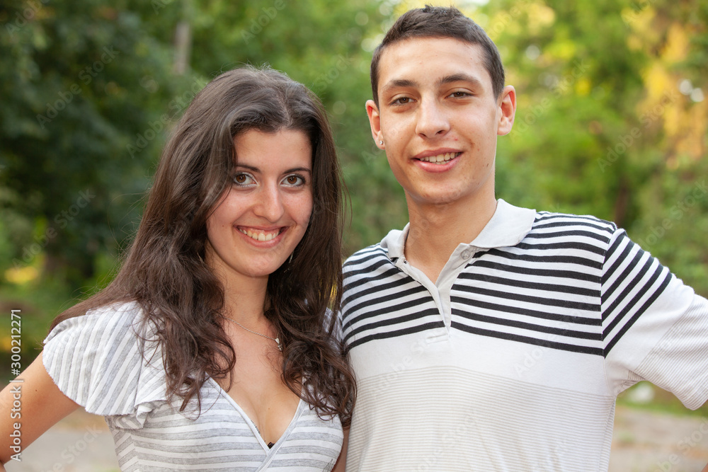 Portrait happy young teenage couple outdoor Portrait happy young teenage couple outdoor