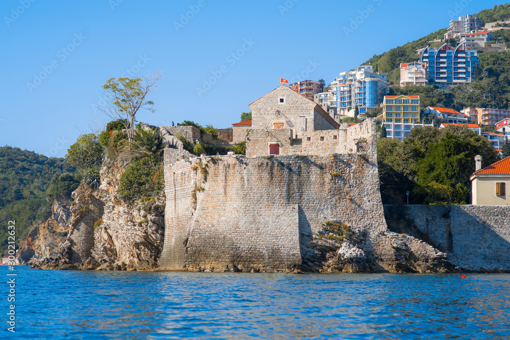 Landscape Adriatic sea view of old town Budva: Ancient walls and tiled roof, Montenegro, Europe