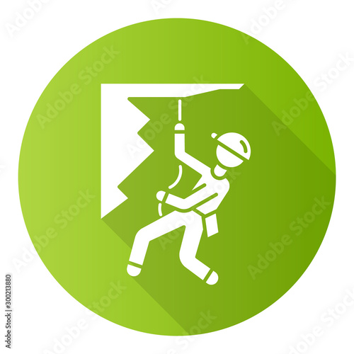 Mountain climbing green flat design long shadow glyph icon. Alpinism, mountaineering. Abseiling, rappelling descend. Caving, spelunking. Mountaineer sliding down rope. Vector silhouette illustration
