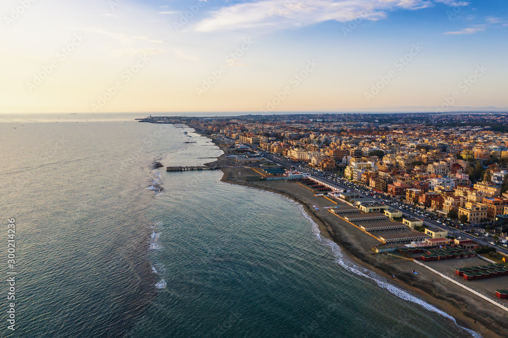Aerial view of Ostia beach near Rome, Italy. Beautiful sea, coast and city view from above, drone photo.