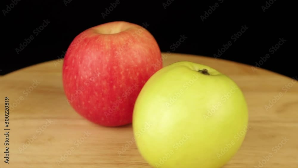 two apples of red and green color rotate 360 degrees. two apples of red and green color rotate 360 degrees.