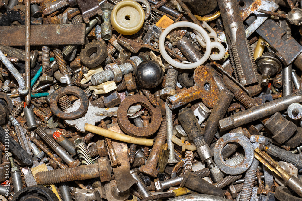 A lot of old rusty various items and tools for construction and repair. Close-up. A lot of old rusty various items and tools for construction and repair. Close-up.