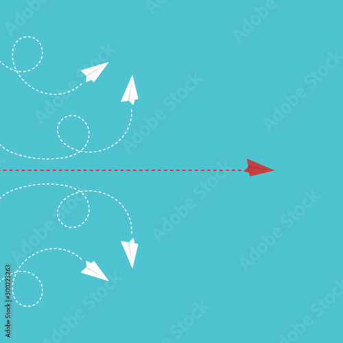  Different Approach - Different Direction. Group of paper airplane in one direction and with one individual pointing in the different way, can be used leadership/individuality/innovation concepts.